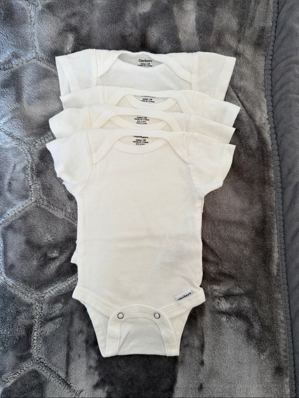 Gerber White Short-Sleeve Baby One-Piece Bodysuit (4 pieces)